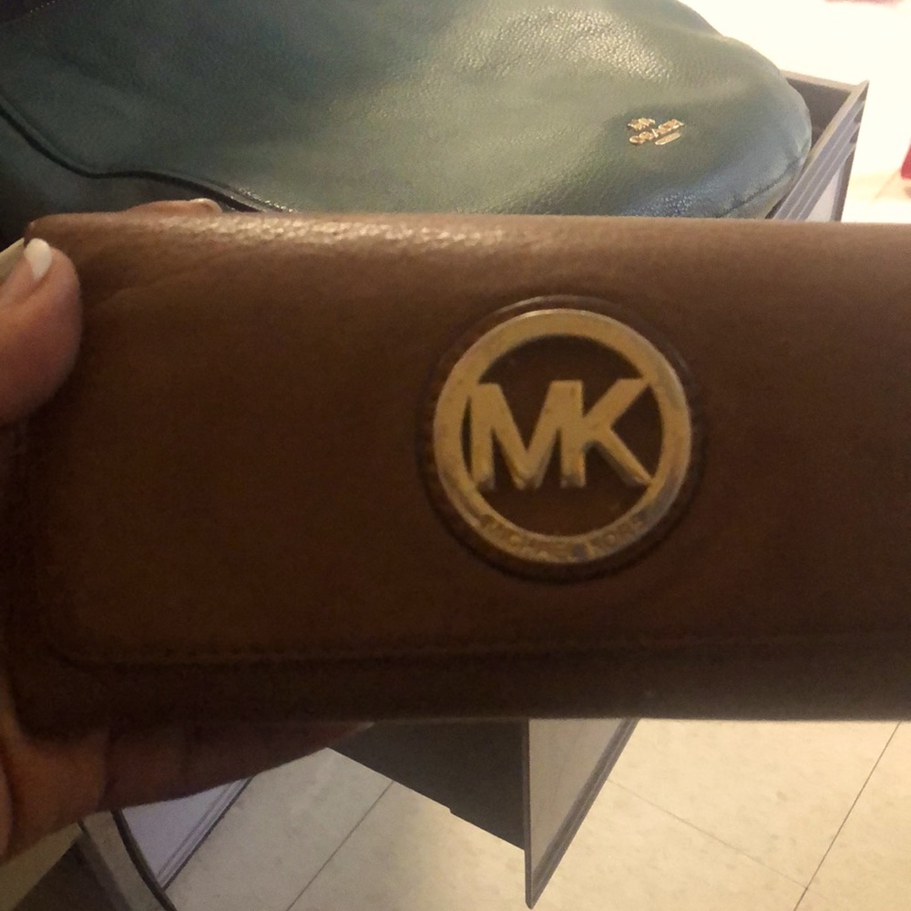 This wallet was very expensive but has been used.